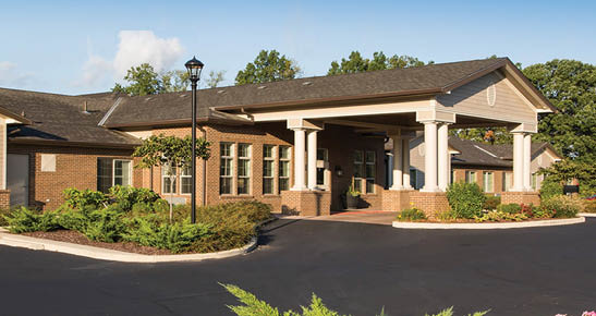 A large building with a black parking lot in front. AI generated content
